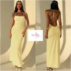 Vestido largo color amarillo detalle de tiras detras