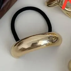 Felpas con formas doradas