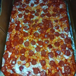 Pizza familiar con salchicha