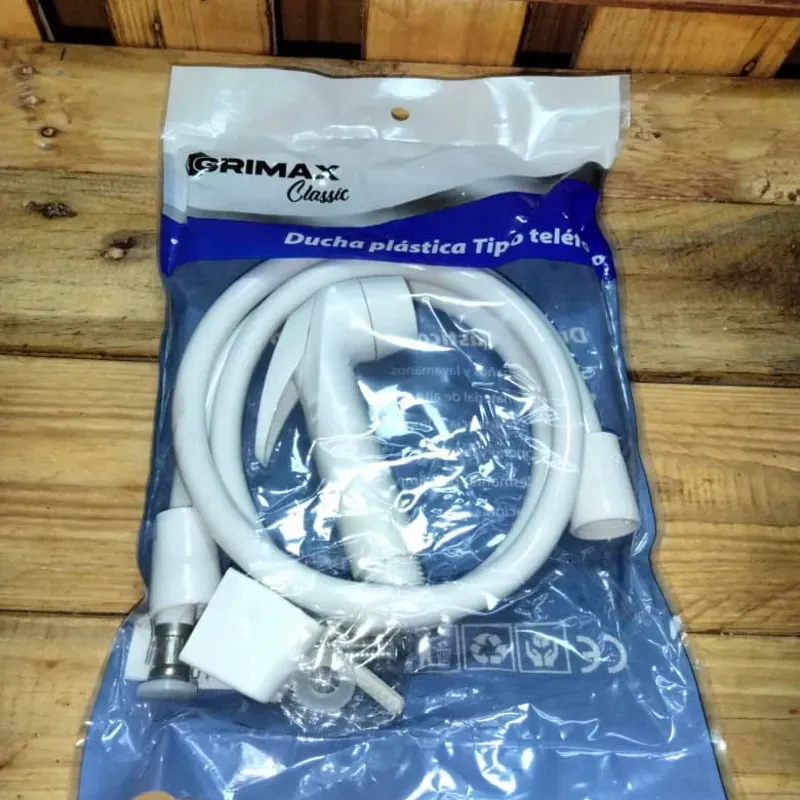 Ducha sanitaria de plástico tipo teléfono de la marca Grimax Classic.