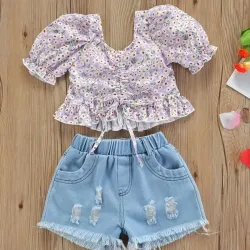Niñas con Blusa Estampada de Flores y Lazo 
