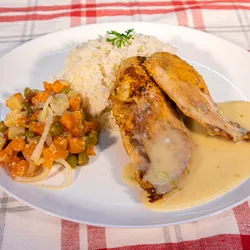 Chicken Supreme Grilled boneless, served with white garlic sauce, white rice, and mixed vegetables.