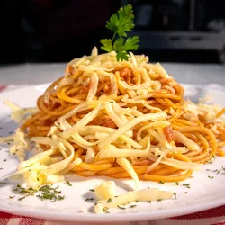 Spaghettini Your choice of tomato sauce with Italian spices or ham and cheese topped with parmesan cheese, served with garlic bread.