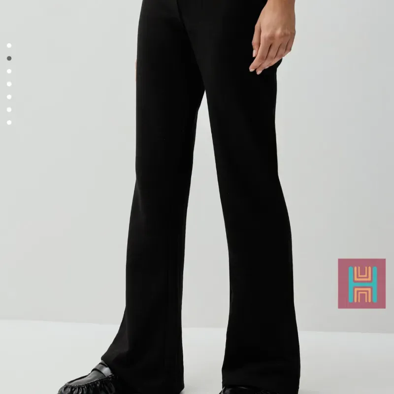PANTALÓN DE CHÁNDAL FLARE NEGRO 0120