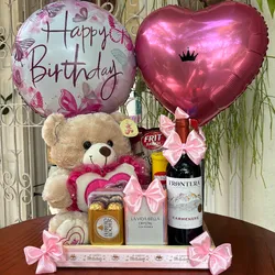 Peluche, botella de vino, perfume, bombones Ferrero rocher y confituras✨