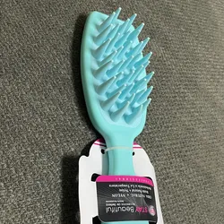 Cepillo masajeador