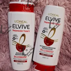 champú y acondicionador L'Oréal Paris Elvive Reparación Total 5, diseñados para el cabello dañado. 