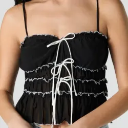 Blusa negra de lazos