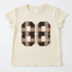 Pulover beige con número
