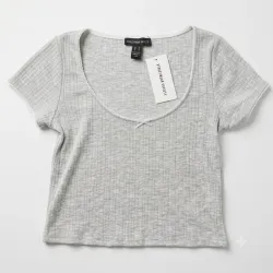 Pulover gris corto