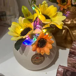 Búcaro, esfera de flores con guirnaldas
