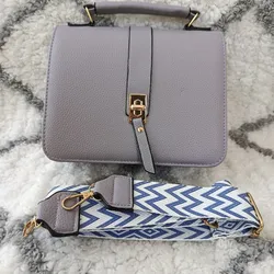Cartera morada gris 10 USD 