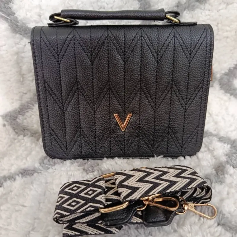 Cartera negra 10 USD 