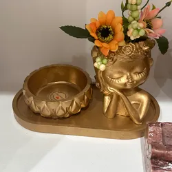 Muñeca dorada con Flores y porta Bella