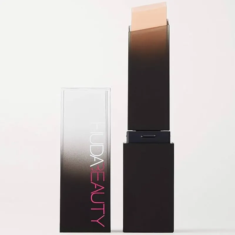 HUDA BEAUTY Base de maquillaje en barra con cobertura modulable 
