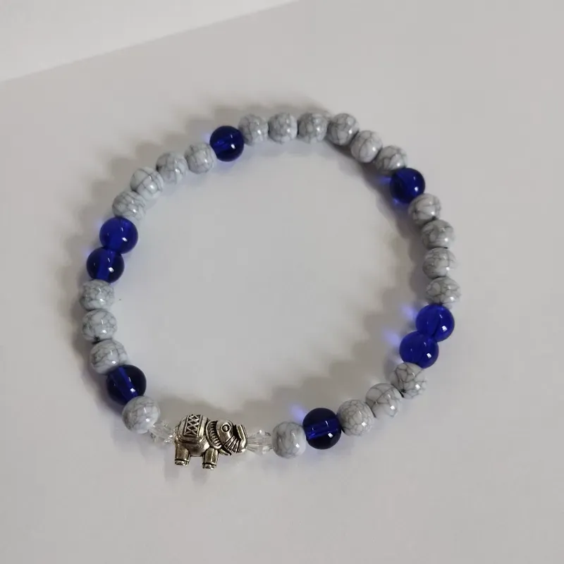Pulsera de cuarzos azules y piedras craqueladas con elefante 🐘