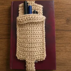 Marcador con bolsillo para lápices