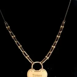 Gargantilla Original 10K Exclusiva Sencilla Tiffany & Co mide de largo 48 cm y posee cierre de langosta