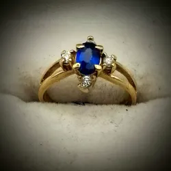 Anillo En Forma de Flor Con Gemas Blancas y Azúl Combinada