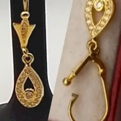 Aretes colgantes punta de flecha con una gota con circones