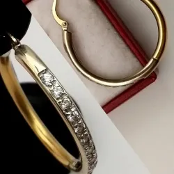 Argollas de oro blanco y amarillo con circones