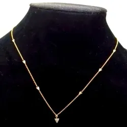 Cadena oro rosa con dije de flecha en oro blanco