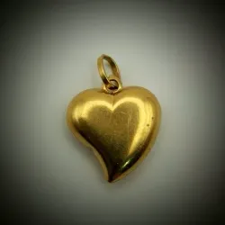 Dije corazón con volumen reversible liso