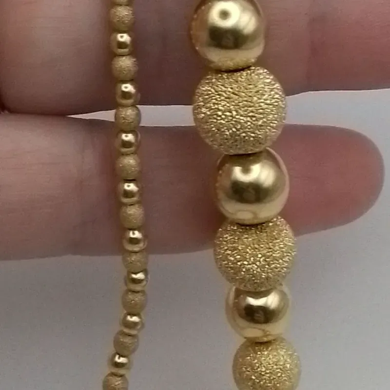 Gargantilla vintage con esferas pulidas y brillantes alternas