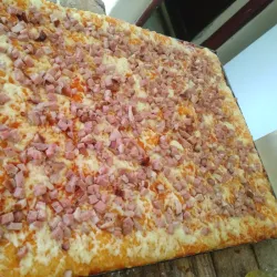 Pizza extra de lomo y jamon 