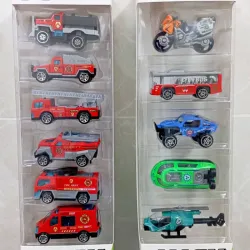 CAJA DE CARRITOS ROJOS O CAJA CON TRANSPORTES VARIADOS*