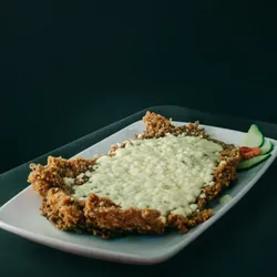 Bistec de cerdo parmesano