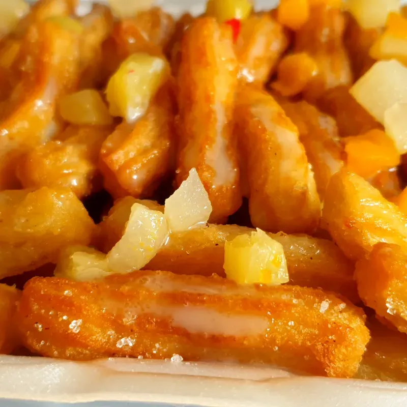 Churros cubiertos de leche condensada