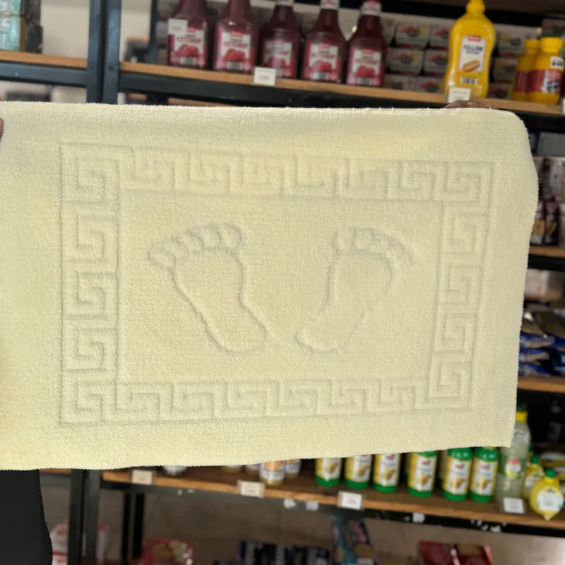 Alfombra de tela para el baño 