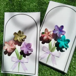 Set de 3 Pellizcos de Flor ,con postal .