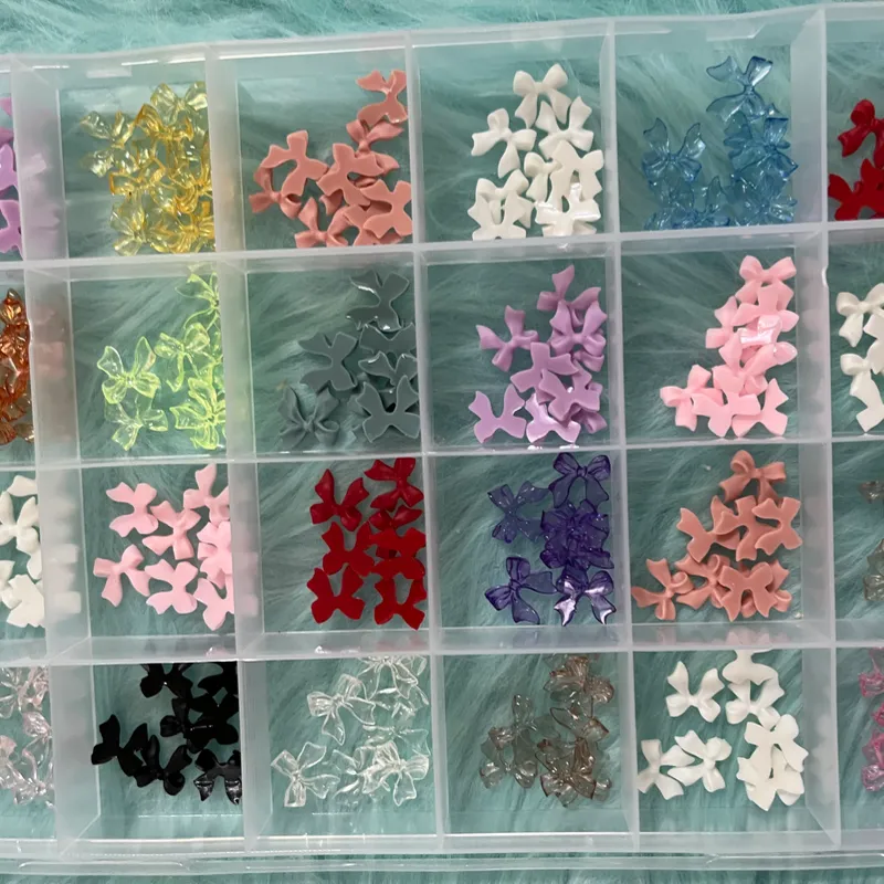 Cajas de lazos y flores de resina 