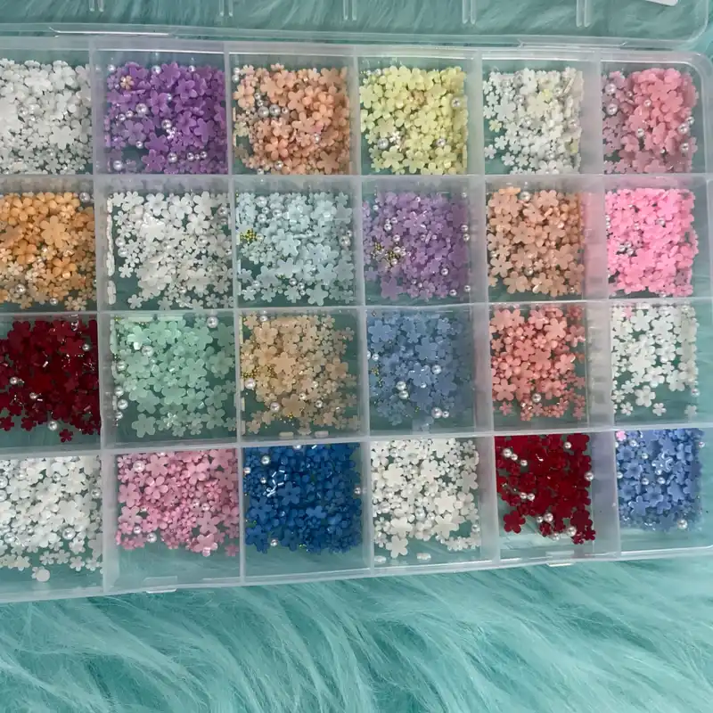 Cajas de lazos y flores de resina 