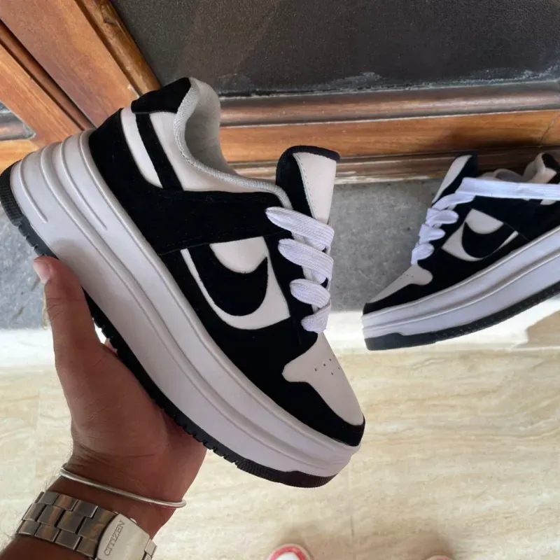 Nike (G)
