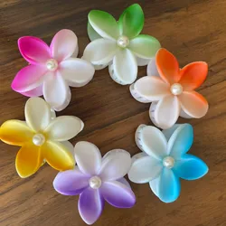 Pellizcos con diseño de flor