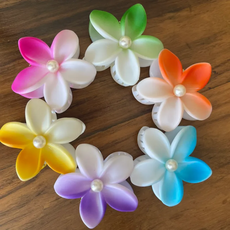 Pellizcos con diseño de flor