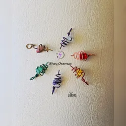 🌀Dije de espiral de cobre y cuarzo: