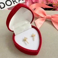 Aretes cruz oro 10 k