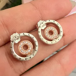 Aretes doble aro con detalles en oro rosa
