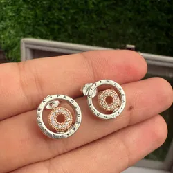 Aretes doble aro oro rosa en el centro