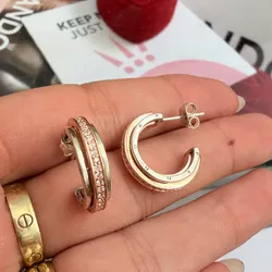 Argollas con detalles en oro rosa