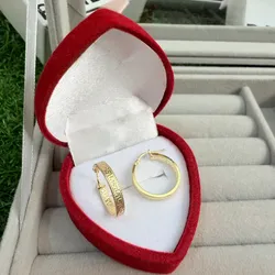 Argollas medianas tipo verssace oro 10 k