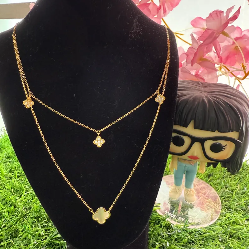Cadena van Cleef doble de 4 flores plata con baño de oro 