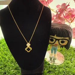 Cadena van Cleef dos flores una negra plata con baño de oro