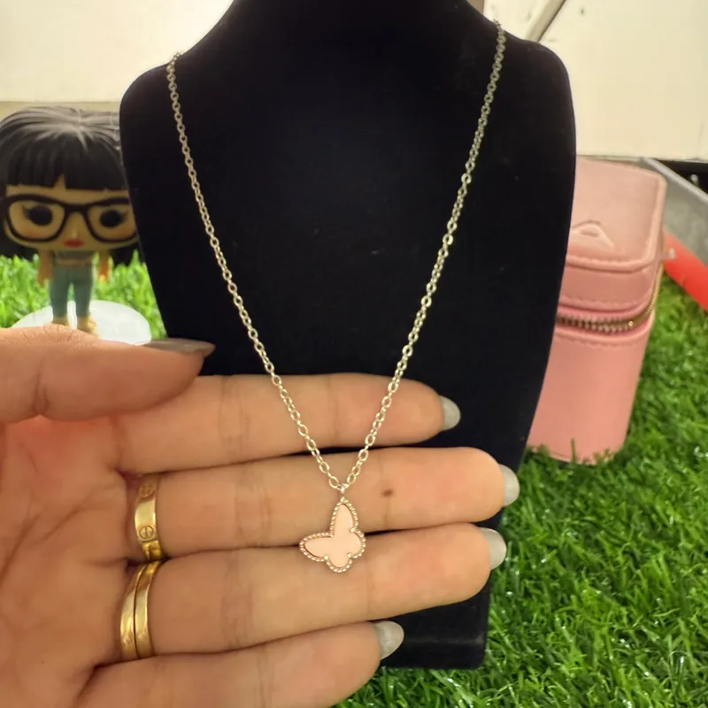 Cadena van Cleef mariposa rosa 