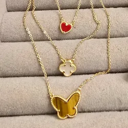 Cadena van Cleef triple con mariposa baño de oro