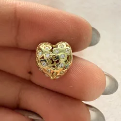 Charm corazón piedras blancas de oro 10 k